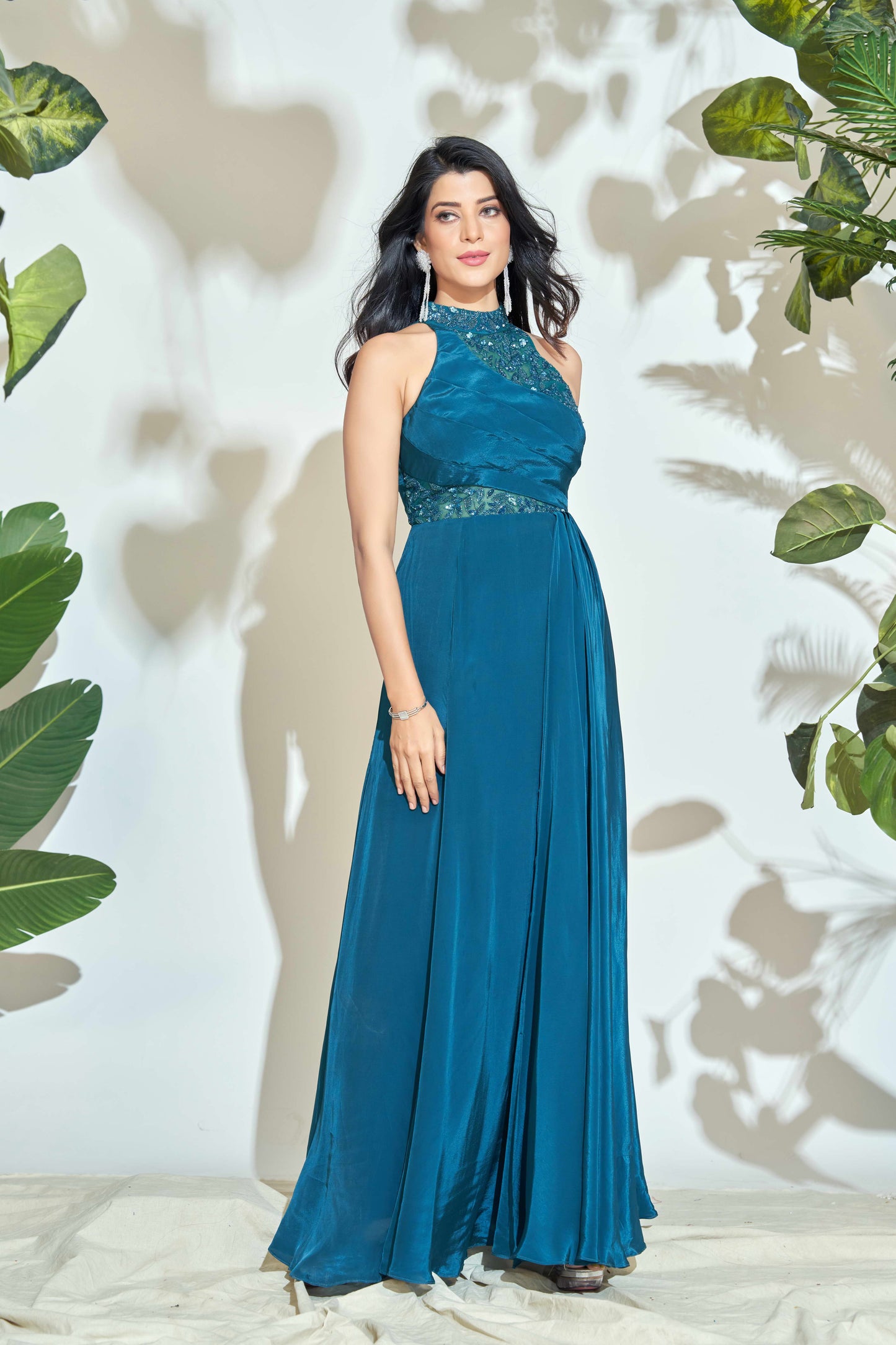 PEACOCK BLUE HALTER NECK GOWN WITH HAND EMBRODIERY